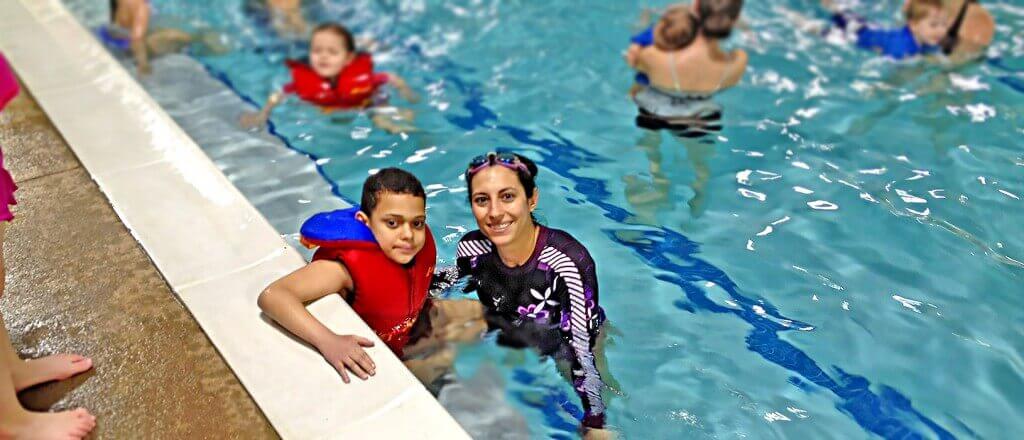 Child and Holly at Peak Potential Therapy special needs summer camp