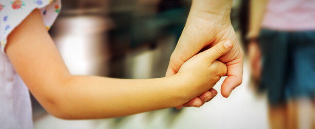 Mother Holding Child's Hand