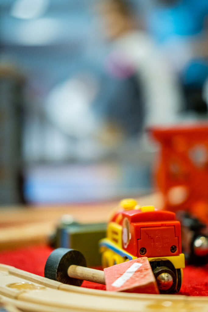 Colorful toy train on a play surface.
